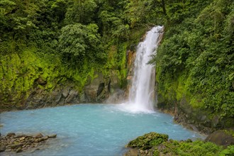 Waterfall with blue turquoise water of the Rio Celeste