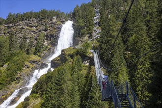 Hiking trail over a suspension bridge along the Stuibenfall near Umhausen