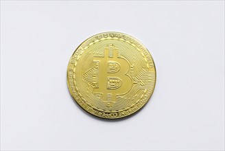 Bitcoin BTC crypto currency gold coins on white background
