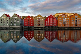 Wooden houses reflected in the water
