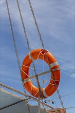 Lifebelt attached to chains on a boat