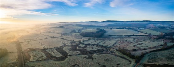 Sunrise panorama over RSPB Exminster and Powderham Marshes and River Exe