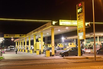 Cars refuelling at a petrol station