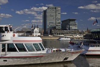 The Rhine with ships and the Lanxess high-rise