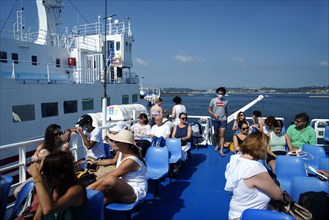 Tourists on the ferry to Procida