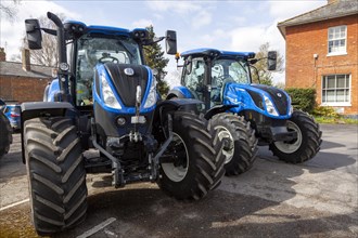 Brand new New Holland tractor T7210 for sale on dealership forecourt