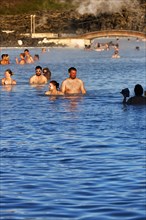 Tourists in thermal bath