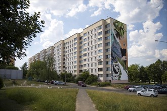 Mural on a residential building in the working-class district of Traktorny Zavod