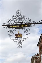 Decorated sign for the Crown Hotel