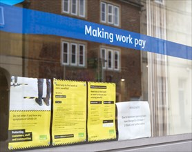 Making Work Pay banner message in window of Job centre