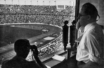 The broadcaster in his cell above the stadium