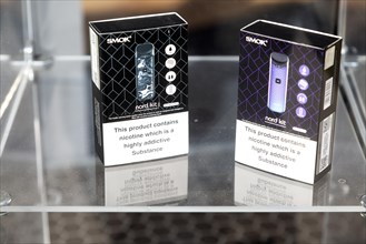Nord Kit vaping nicotine Smok boxed products in shop window display