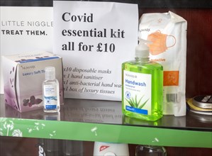 Covid essential health hygiene kit in pharmacy chemist shop window