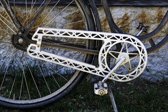 Beautifully decorated chain guard on an old bicycle