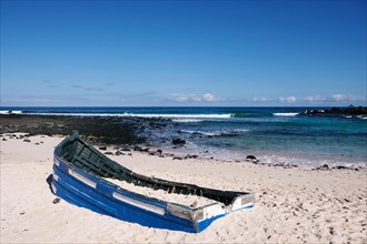 Stranded fishing boat on Caleta del Mojon Blanco beach