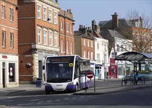 Single-decker Faresaver bus town centre bus stop