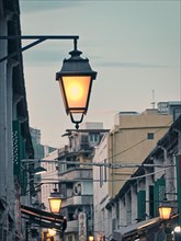 Classical street lamp on white wall