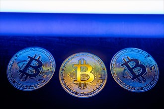 Bitcoins are golden coins and a new cryptocurrency