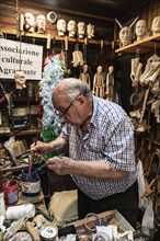 Puppet maker Vincenzo Argento in his workshop