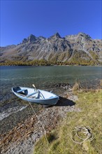 Lake with boat in autumn