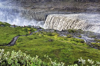 Hikers at the edge of Dettifoss