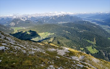 View into the valley with mountain panorama