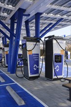 Electric charging station for electric vehicles