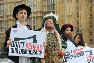 Henry VIII at Westminster as anti-Brexit protestors dressed in Tudor costumes demand protection for democracy. London