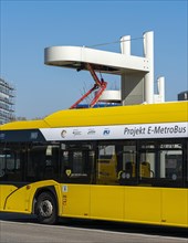 E-Metro Bus at the charging station at Zoologischer Garten bus station in Hertzstrasse