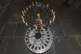 Burning sacrificial candles in the Sebaldus Church
