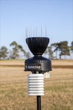 Sencrop Raincrop V14 agricultural weather station equipment in farm field
