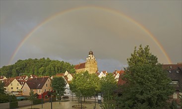 Rainbow over collegiate church and old town