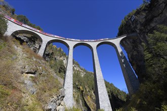 Railway viaduct with train