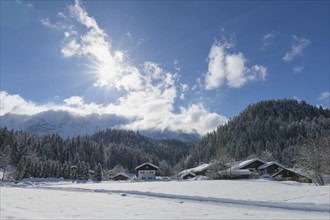 Winter landscape with Wetterstein mountain and sun