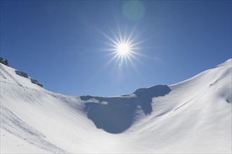 Karwendelgrube Karwendel mountainrange with sun in winter
