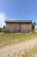 Barn with prohibition sign