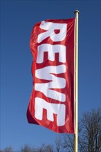 Flag with writing REWE
