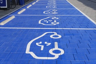 Ground marking pictogram on car park for electric vehicles