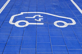 Ground marking pictogram on car park for electric vehicles