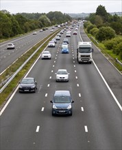 Traffic vehicles driving M4 motorway view east from near Dauntsey