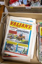 Pile of Valiant children's comic on display at auction