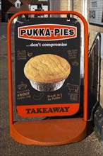 Pukka-Pies Takeaway sign outside chip shop