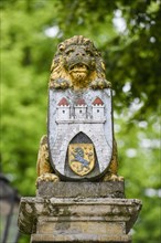 Lion with city coat of arms