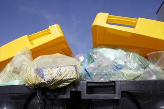 Yellow bin for plastic waste