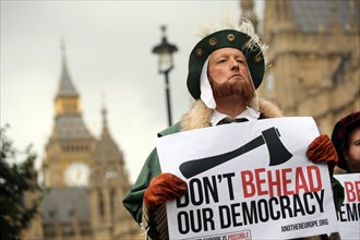 Henry VIII at Westminster as anti-Brexit protestor dressed in Tudor costume demand protection for democracy. London