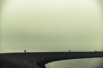 Walkers on the North Sea coast