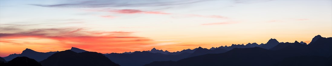 Mountain panorama in front of sunrise from Portlakopf