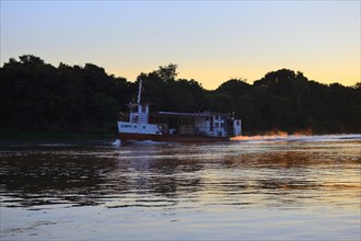 Riverboat on the Rio Sao Lourenco at sunrise