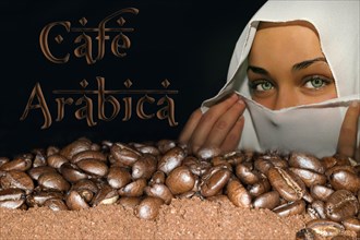 Coffee beans of the Arabica variety lying on ground coffee