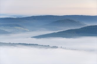 View from Katzenbuckel mountain with morning mist